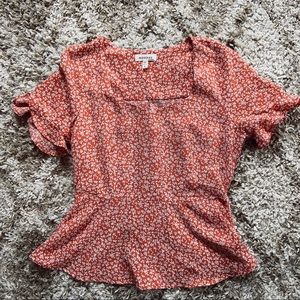 { Monteau } Floral Peplum Top